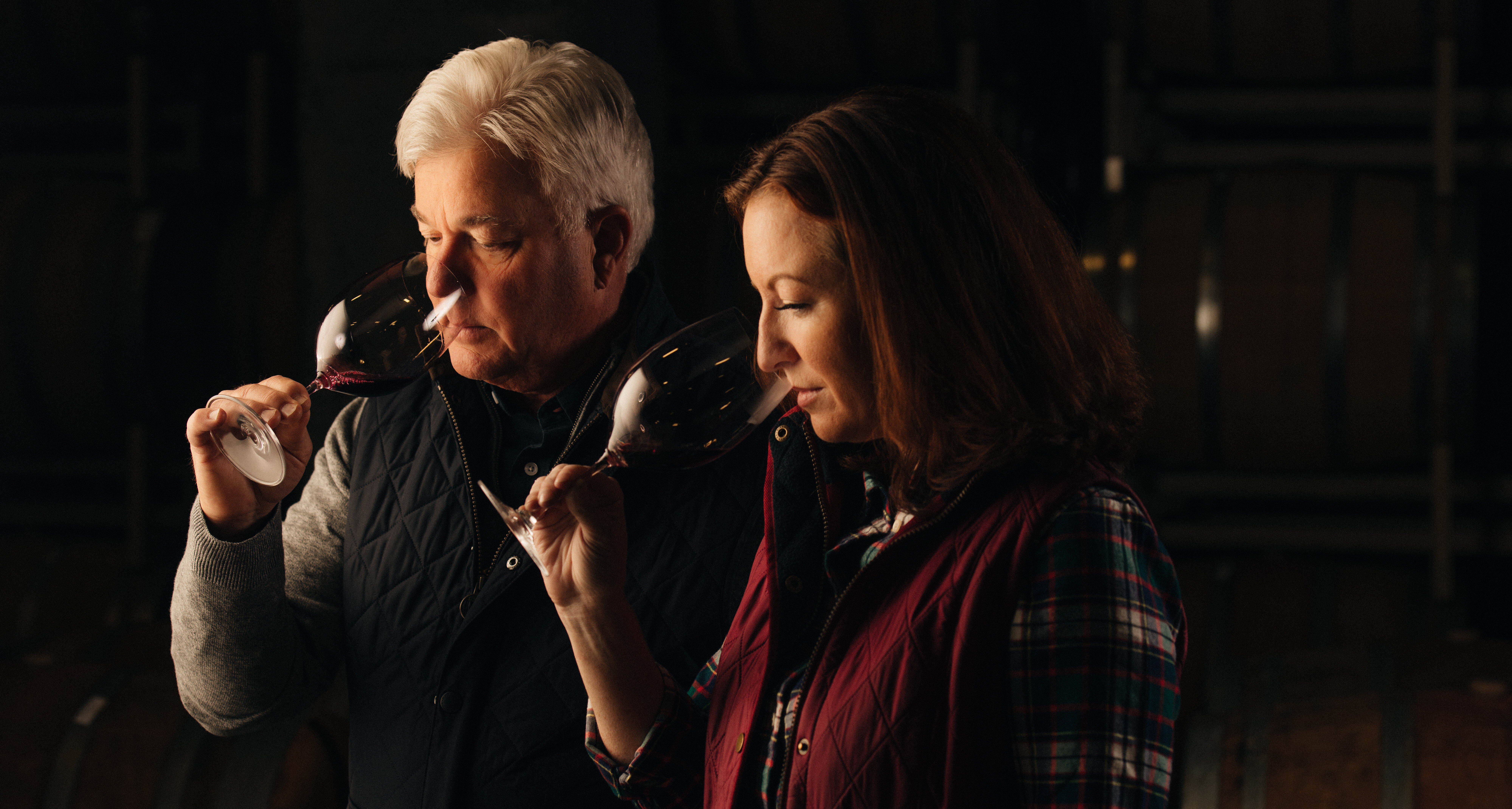 Ted and Kristy tasting wine