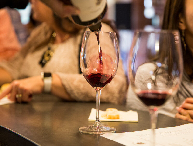 Pouring a bottle of Freemark Abbey red wine