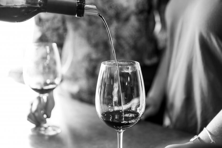 Pouring a bottle of wine