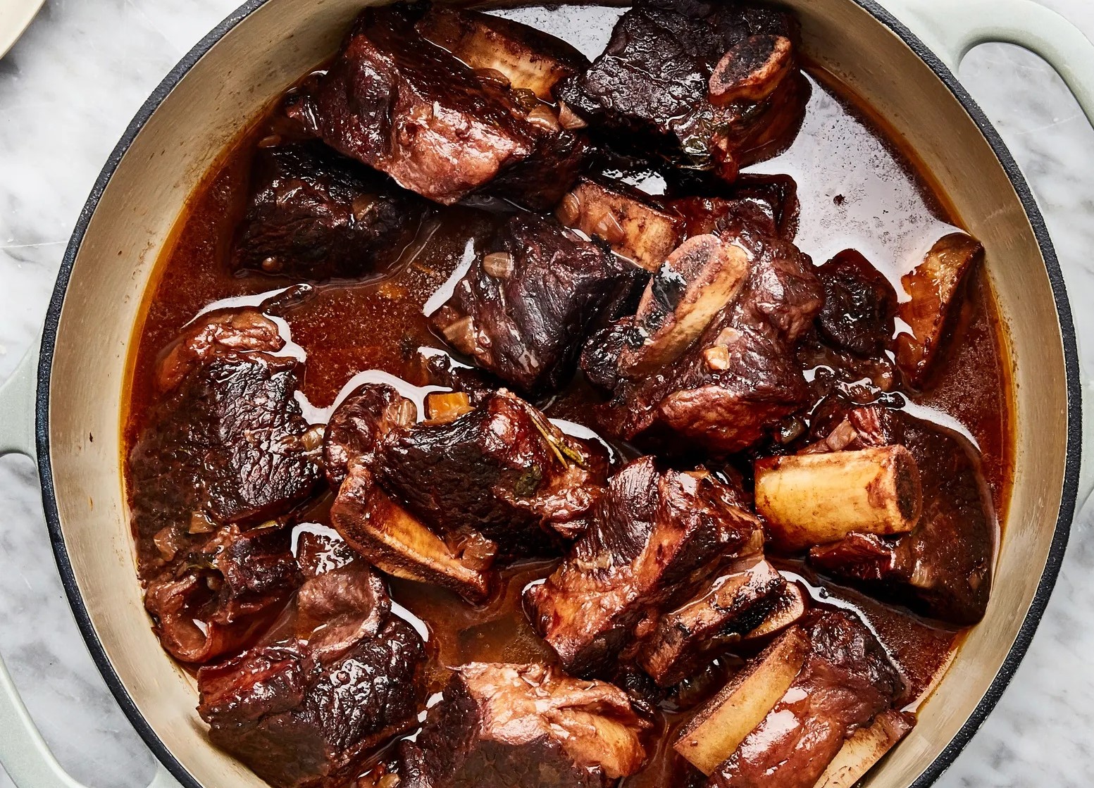 Red wine braised short ribs in a pot