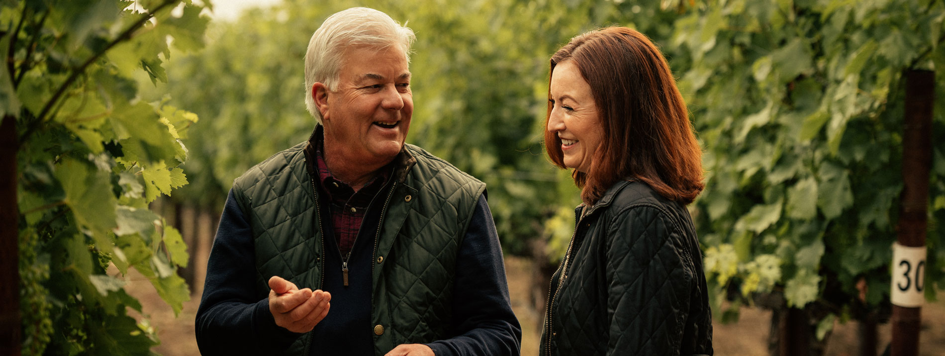 Ted Edwards talking with winemaker Kristy Melton
