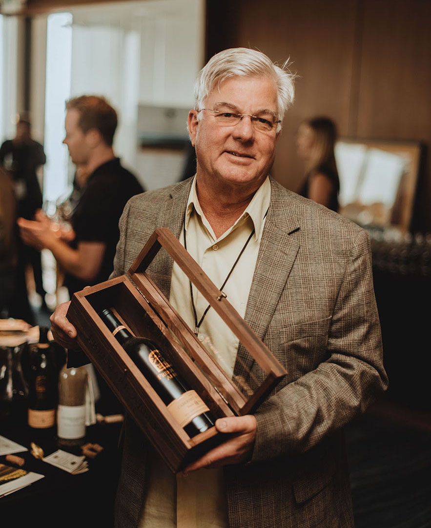 Emeritus vintner Ted Edwards showcasing a 1994 Cabernet Bosché at the Rutherford Dust Society's annual “Day in the Dust” tasting at a historic San Francisco yacht club.