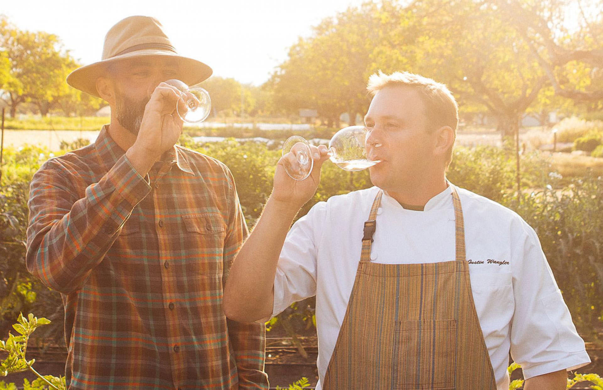 Tucker Taylor and Justin Wangler sipping wine