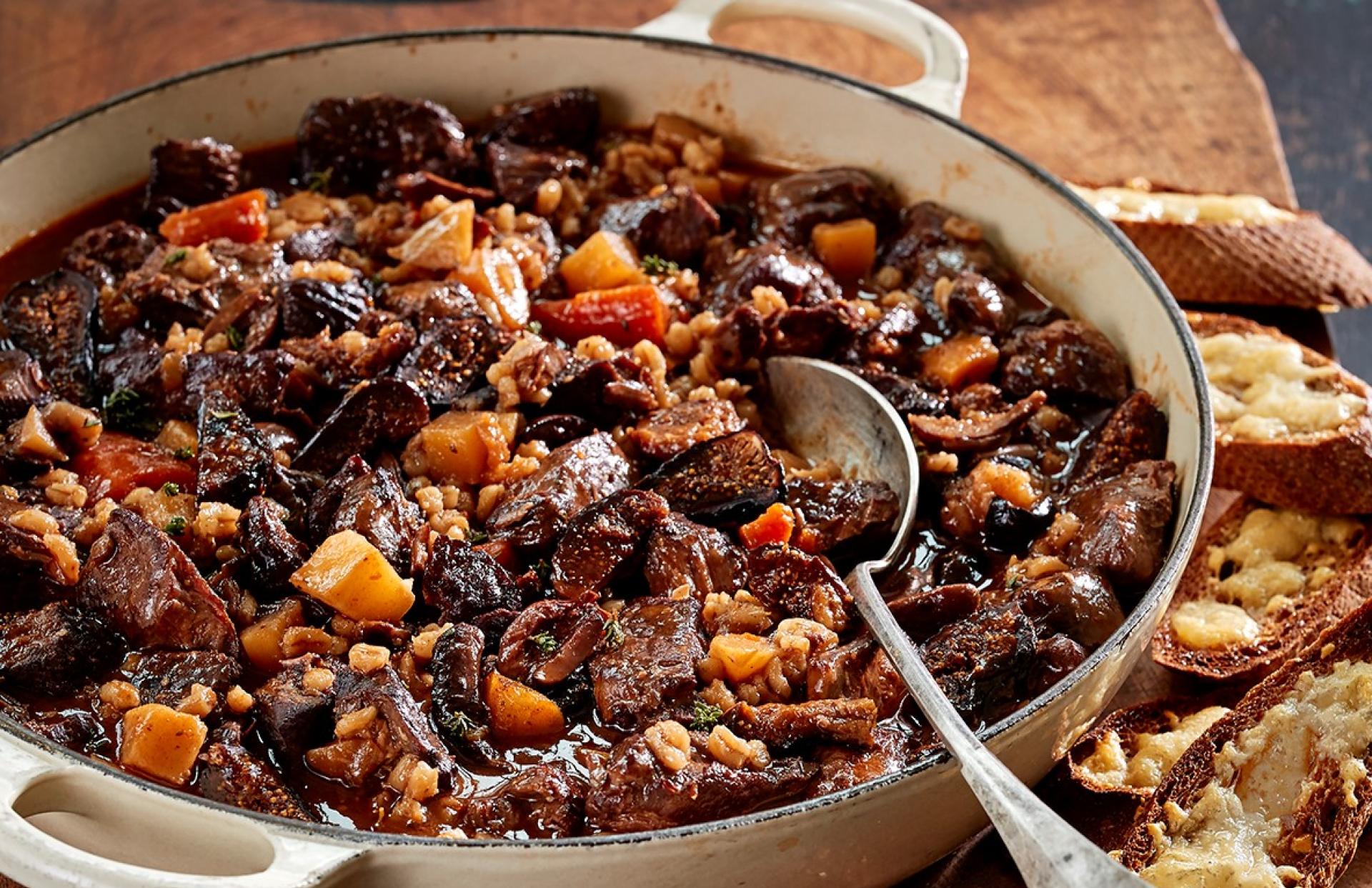 Lamb & Barley Stew with Dried Figs, Olives & Gruyère Toasts