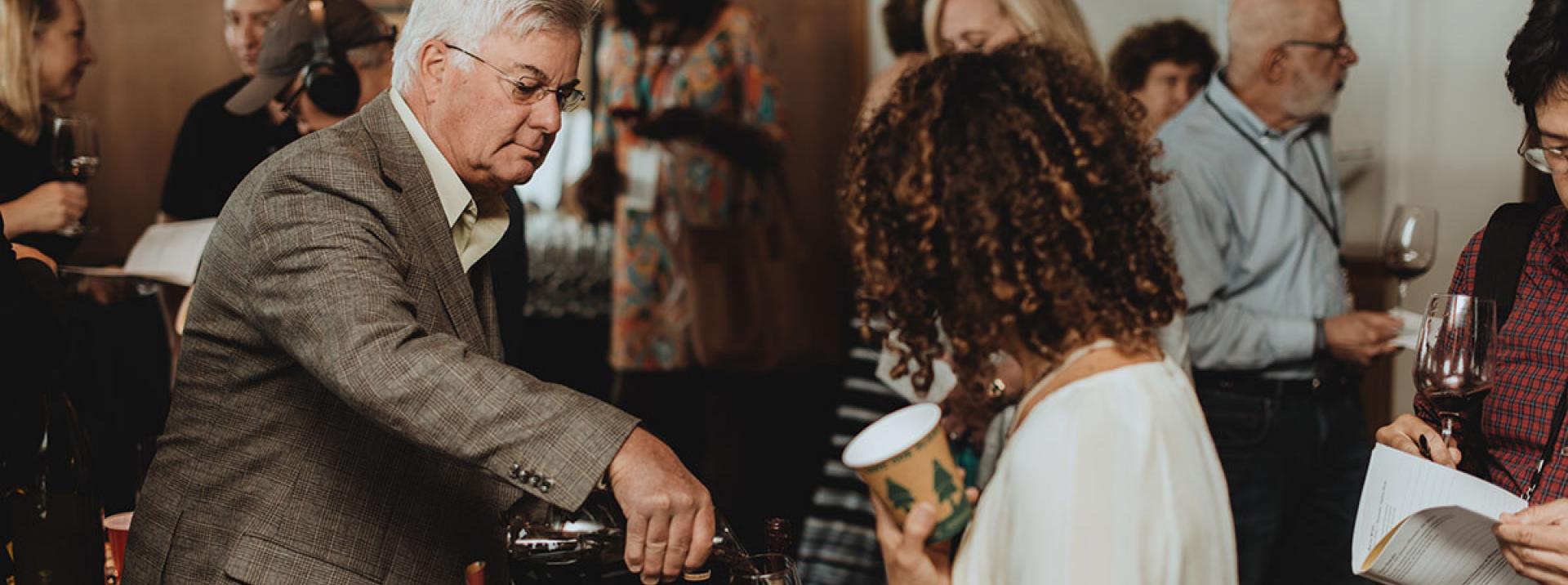 Emeritus vintner Ted Edwards showcasing a 1994 Cabernet Bosché at the Rutherford Dust Society's annual “Day in the Dust” tasting at a historic San Francisco yacht club.